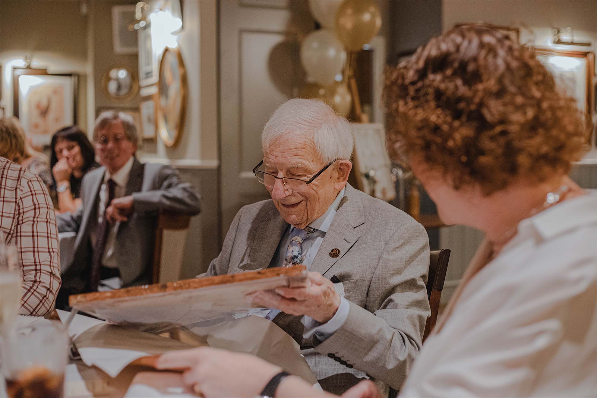 residents at a birthday celebration