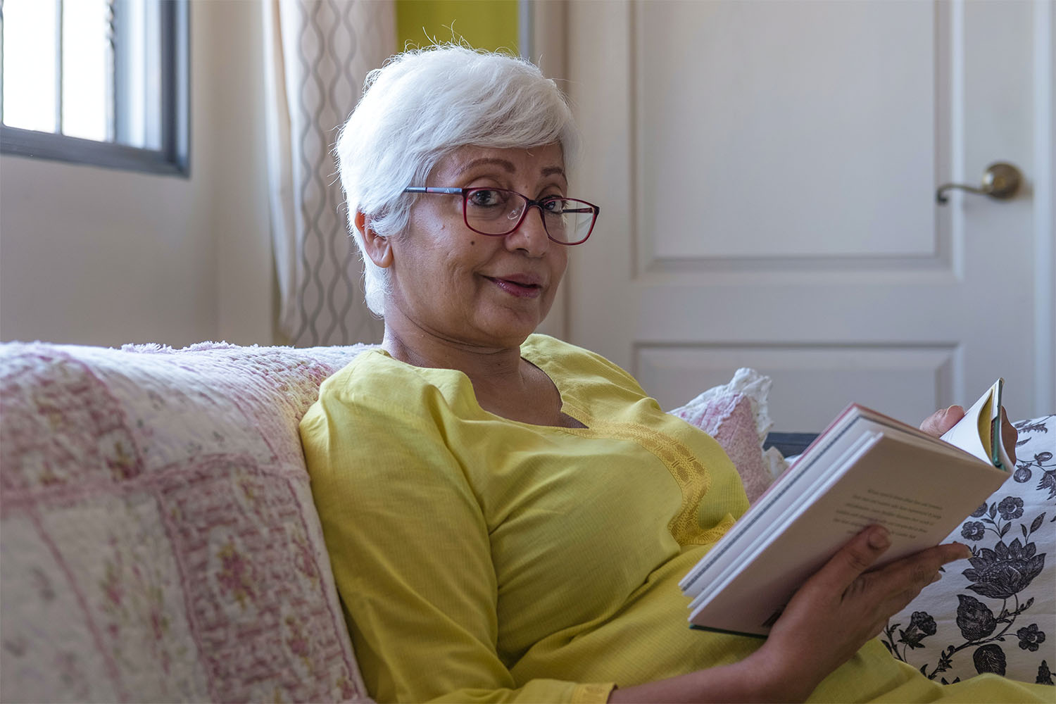 resident sat reading a book