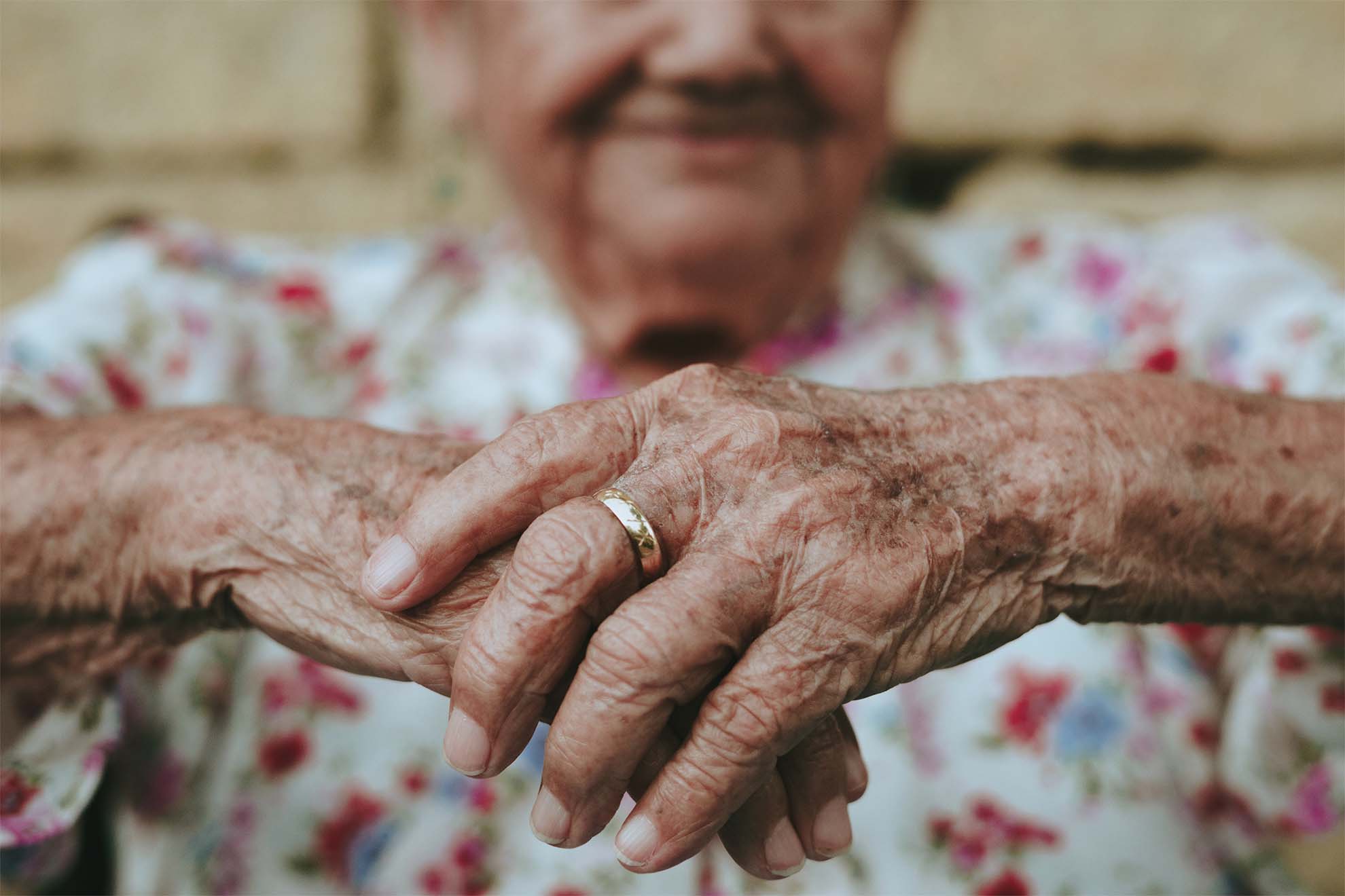 resident holding their hands together