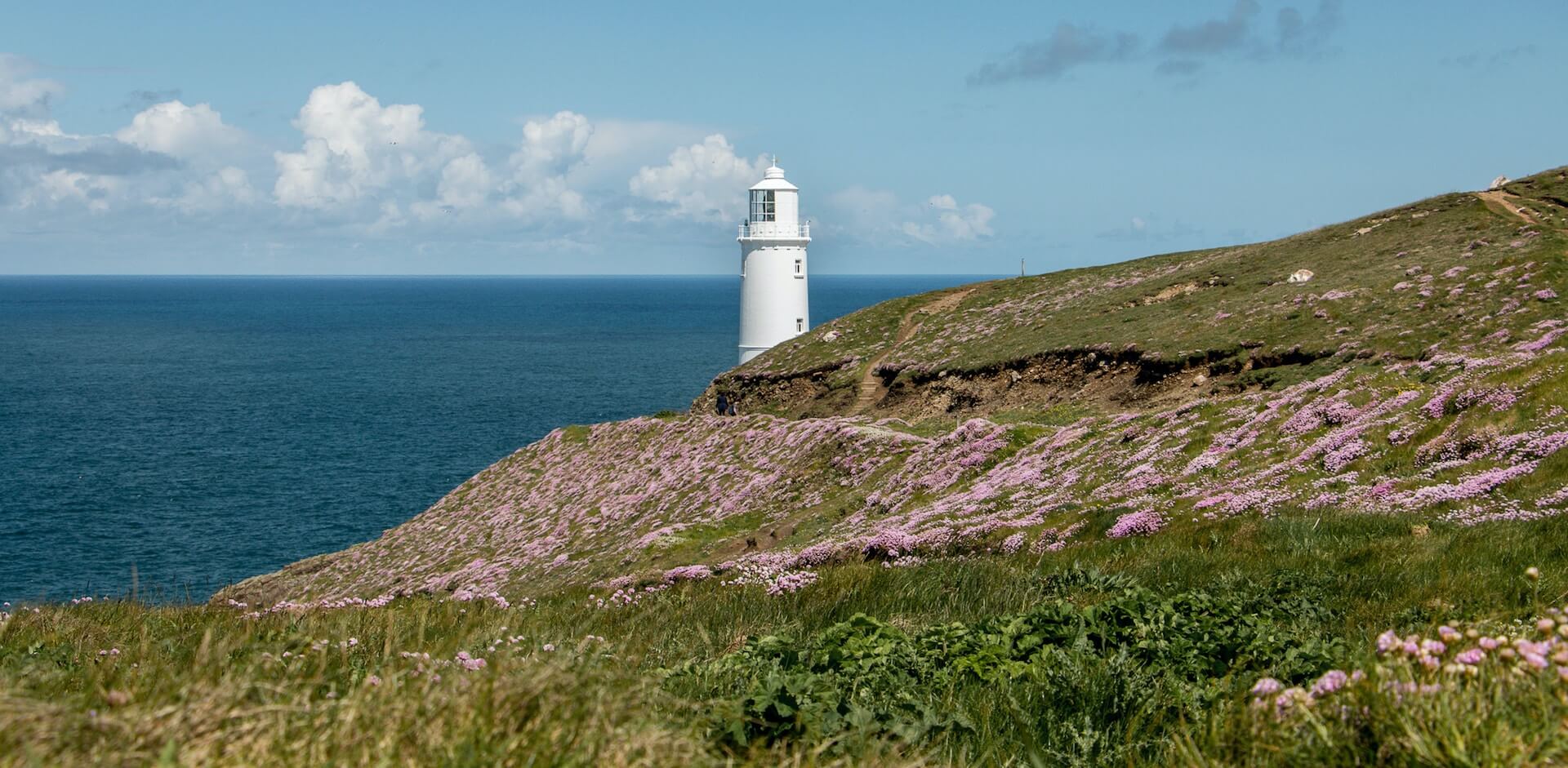 A lighthouse and the sea in Hartland, Bideford