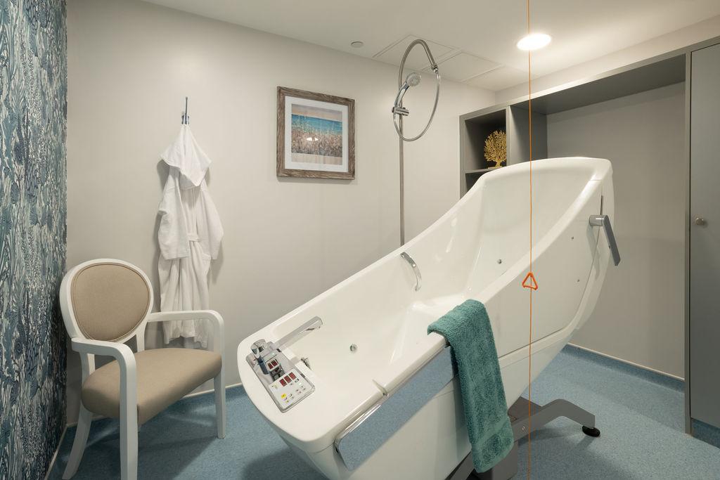 one of our bathrooms with an assisted bath