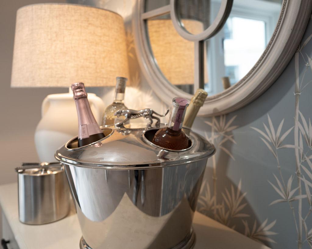 wine cooler with bottles inside of it