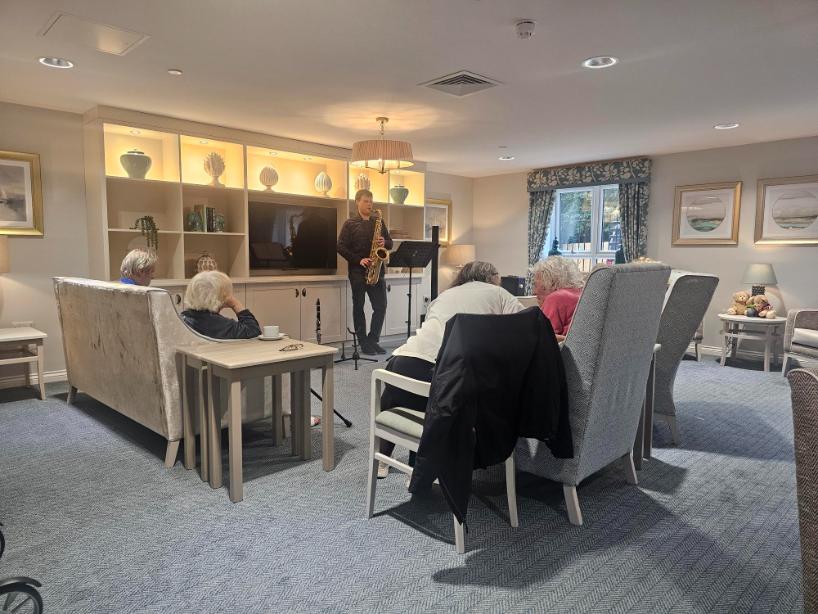 Jonathan playing Saxaphone for the Highwood Care Home residents