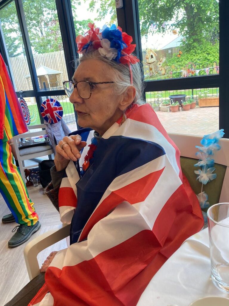 resident with VE themed accessories on