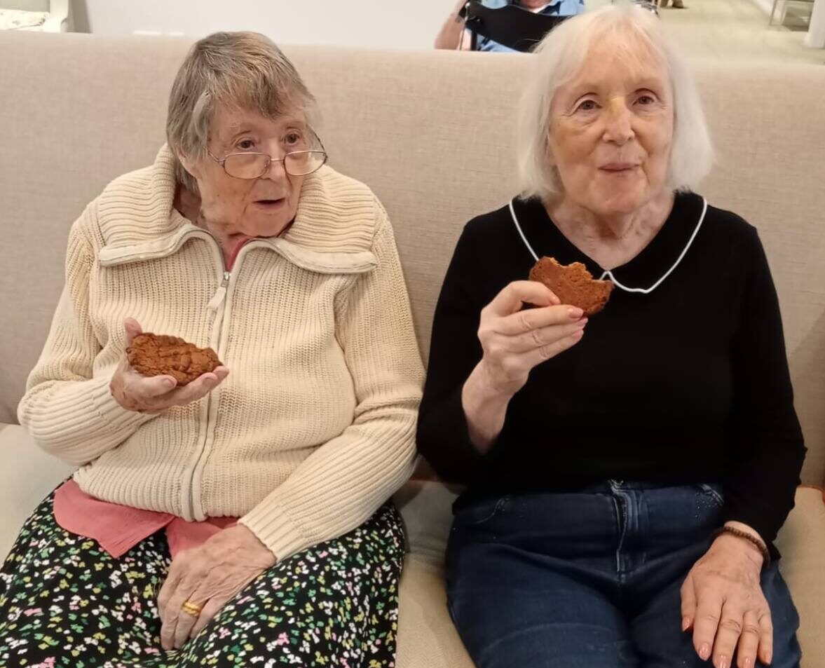 Residents eating cookies