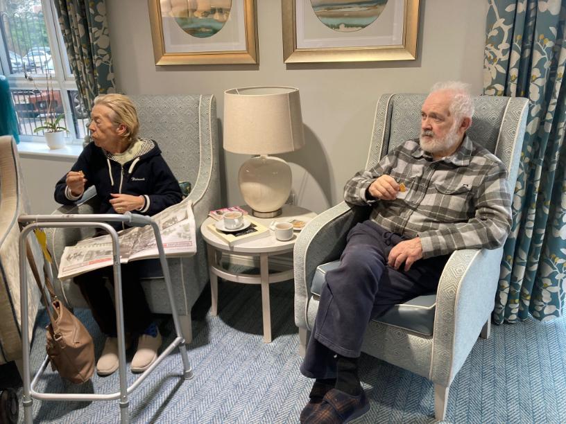 two older residents sat down