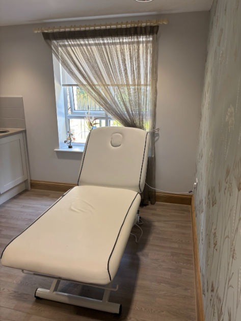 Reclining spa chair in the holistic therapy room at Highwood Care Home